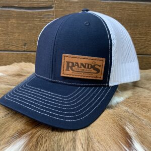Rand’s Custom Hat in leather patch on a Richardson Adjustable Trucker 112. Navy and white mesh
