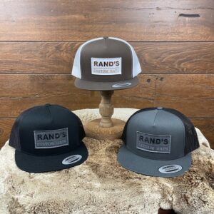 Rand’s Custom Baseball Caps, Yupoong Brand, Snapback. From Left to Right: Black with Black mesh, Brown with White mesh, and Charcoal with Black Mesh